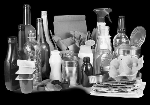 Professionals handling furniture clearance in a Putney living room