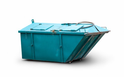 Workers loading furniture from a Putney flat into a removal van